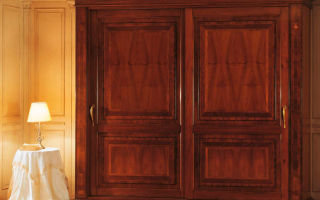 Features of sliding wardrobes made of solid wood, an overview of models