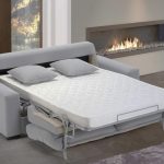 Light gray sofa bed with orthopedic mattress