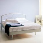 Double bed on a metal frame