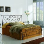 Double bed with an unusual headboard
