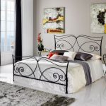 With wrought headboard